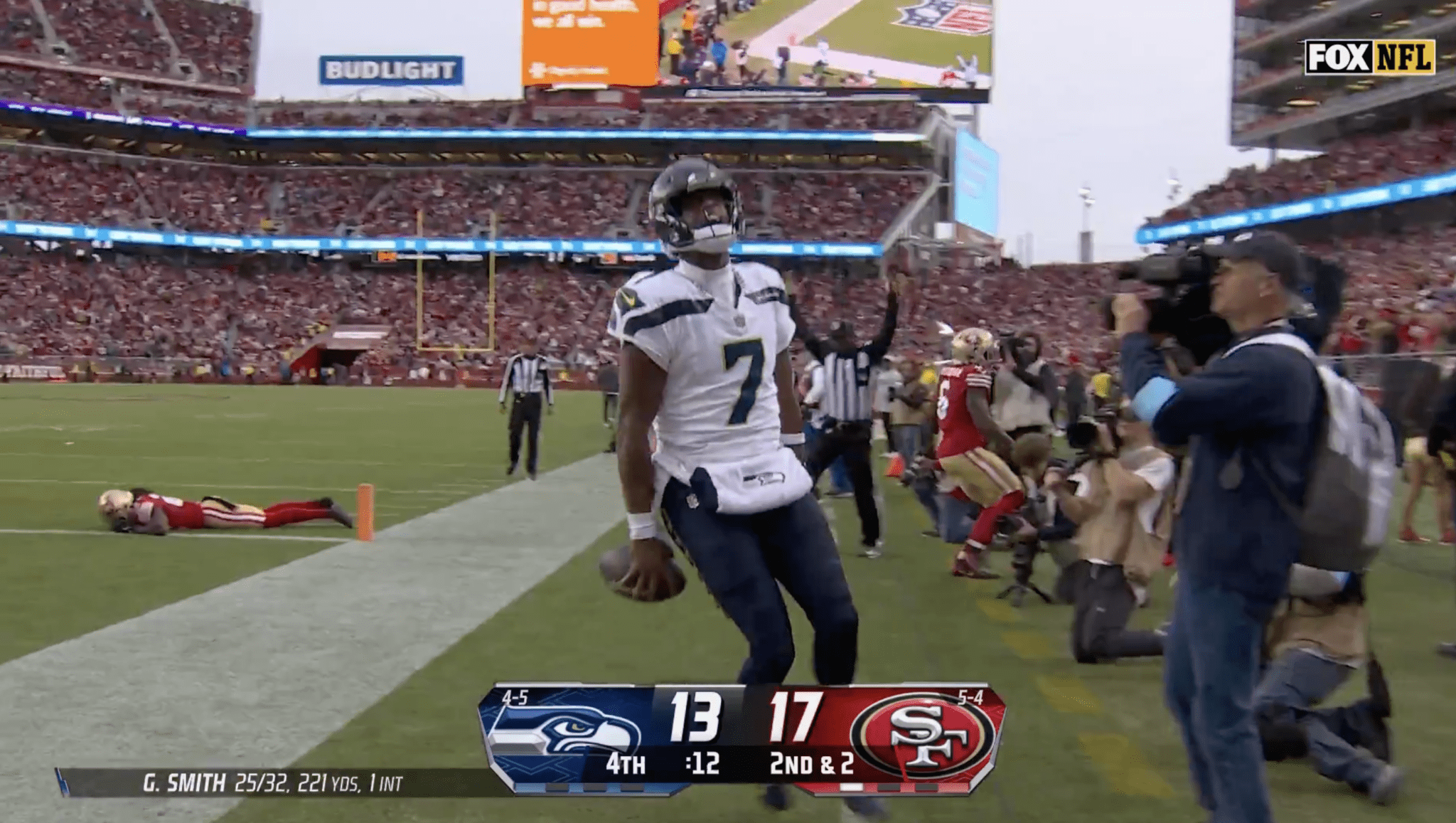Geno Smith celebrating after touchdown run